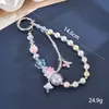 Nuevo colgante de manzana y mariposa con cuentas hecho a mano para teléfono, con un toque de alta gama, charm de cadena doble para bolso, cadena para colgar el teléfono, regalo
