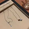Colar de Pedra Olho de Tigre Sintético Novo para Outono e Inverno para Mulheres, Estilo Maillard Vintage, Luxo Leve, Sensação de Alto Padrão, Corrente para Suéter Simples e Exquisita