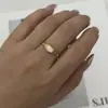 Nuevo anillo geométrico vintage europeo y americano con patrón de sol y piedra ojo de tigre para mujer, anillo de línea en forma de corazón moderno y versátil