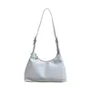 Bolso Tote Yozzi 2026 Modelo Nuevo de Primavera Color Sólido Estilo Coreano Gran Capacidad Bolso de Mano para Viajes Cotidianos Bolso de Hombro Casual Elegante