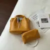 Bolsas femininas de nicho de alta qualidade 2026 novas e estilosas bolsas tiracolo trançadas super vendidas estilo coreano bolsas de mão tipo balde