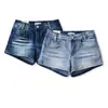 NZ265-26 Verano Estilo Coreano de tiro bajo, realzan las caderas, rotos, orejas de gato, lavado de mezclilla, shorts de mezclilla calientes