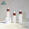 En Stock 15ml 20ml 30ml 50ml Botellas para Aceites Esenciales con Anillo de Madera de Nogal Botellas Gotero de Vidrio de Grado Alimenticio Venta al por Mayor Capacidad Pequeña