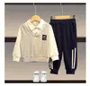Ropa de niño otoño traje de niño otoño manga larga suéter de dibujos animados pantalones casuales ropa deportiva para niños conjunto de dos piezas