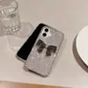 Nueva Funda de Teléfono de Lujo de Gama Alta con Concha Incrustada de Pedrería y Lazo de Perla para Apple 17 Pro Max Simple 1