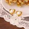 Pendientes de Perla Otoño e Invierno Pendientes Geométricos de Corazón Versátiles Nicho de Gama Alta Lujo Ligero Exquisitos Pendientes Metálicos para Mujer