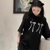 Blusa de Seda de Leite Estilo Coreano Estampa de Laços Manga Curta Verão Nova Solta e Versátil Feminina Estudante Chique