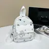 Linda mochila pequeña para mujer, estilo japonés, perfecta para salidas, con diseños de estrellas y moños, una pequeña bolsa de estudiante, una mini mochila única y casual
