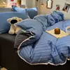 Ropa de cama 2026 nuevo modelo juego de cuatro piezas: sábana, funda de edredón, protector de colchón, juego de tres piezas para cama individual de dormitorio universitario