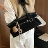 Bolso de hombro nuevo y elegante de ante 2026 con gran capacidad bajo el brazo y colgante exquisito, uso diario sencillo para mujeres en otoño