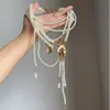 Collar de Cadena para Clavícula de Mujer con Borla de Perlas Retro de Alta Resistencia, Diseño de Nicho, Lujo Ligero, Versátil, Elegante, Multicapa
