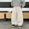 Ropa Infantil Tongku Colección Otoño 2026 Pantalones Largos Casuales para Niños con Bordado de Letras Versátil Estilo Coreano Pantalones Deportivos Sueltos para Niños