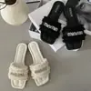 Sandalias planas de tiras con pedrería y punta abierta para uso en exteriores, nuevos zapatos con flecos para mujer, sandalias de verano 2026 de suela blanda, modernos y a la moda