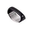Bestseller transfronterizo en stock: Prensa de ajo manual de acero inoxidable de grado alimenticio con múltiples agujeros, multifuncional y segura para las manos