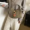 Bolsa transversal moderna e estilosa, novo design de nicho 2026, bolsa feminina para o dia a dia, estilo saco, bolsa de ombro retrô para o trabalho