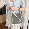 Bolsa feminina de nicho de alta qualidade 2026 nova outono versátil casual transversal, bolsa de balde de ombro único super popular