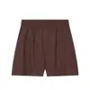 Conjunto de ropa de mujer transfronteriza estilo europeo y americano, moderno chaleco de lino cruzado con cinturón y pantalones cortos casuales con cintura elástica