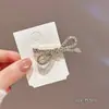 Serie de plata de lujo ligero clip para el pelo de lazo con diamantes brillantes clip para flequillo lateral de chica dulce y cool clip de pico de pato de alto temperamento