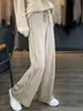 Pantalones de diseño para mujer de punto de cintura alta, color liso, con flecos deshilachados, corte ancho, holgados, adelgazantes, estilo coreano, para ir al trabajo, de pierna ancha, hasta el suelo
