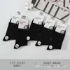 Série Xin Shiyu Outono e Inverno Novo Estilo Meia de Algodão Espessa All-In-One de Cano Médio, Meias Lisas de Ponto Duplo Perfumadas, Modernas e Versáteis