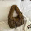 Bolsa de Pelúcia Feminina 2026 Novo Estilo Outono Inverno Nicho Super Quente Bolsa de Mão Estilosa para o Dia a Dia Versátil Bolsa de Pelo
