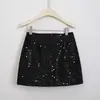 Falda bodycon casual de gamuza con lentejuelas estilo coreano para mujer en otoño, estilo puro y seductor, minifalda de línea A anti-exposición para mujeres petite