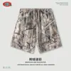 Conjunto de Verão Estilo Americano com Transfer de Calor Camuflado para Casal: Camiseta de Manga Curta e Regata com Alça Única e Shorts para Homens e Mulheres.