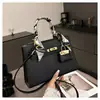 Bolso de Mano de Alta Gama para Mujer, Modelo Nuevo Verano 2026, Versátil para el Trabajo, Bolso tipo Kelly de Hombro Cruzado