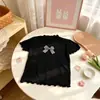 2026 Novo Estilo de Verão Saia Xadrez Doce, Conjunto de Duas Peças com Top de Manga Curta Florido da Moda e Versátil para Crianças