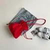 Bolso tipo cubo ligero con cordón de nailon estilo coreano Ins Modelo Nuevo 2026 Moda Transfronteriza Versátil Bolso de Hombro Moderno