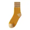 Calcetines cálidos de rizo para invierno forrados de felpa gruesos para el frío cálidos para hombres y mujeres con invierno [calcetines de rizo a rayas retro]]