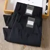 Pantalones de traje de estación europea de alta gama, sedosos, elásticos, antiarrugas, sin planchado, para hombres jóvenes y de mediana edad, de verano, finos, de estilo business casual