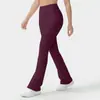 Pantalones de yoga acampanados de cintura alta que realzan las caderas para mujer, hechos de nailon con una sensación casi imperceptible, diseño de pierna ancha ligeramente acampanada, adecuados para danza, fitness y deportes, y se pueden usar como ropa exterior