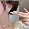 Pendientes Serie Camelia Diseño de Nicho Sentido Avanzado Temperamento Pendientes de Flor Sin Agujeros en las Orejas Placa Mosquitera Clip para Oreja Mujer