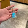 Chaveiro de acrílico transparente com areia movediça de desenho animado, pingente de bolsa, pequeno presente para crianças, decoração de carro