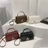 Bolso de Mano Cuadrado Pequeño con Textura de Moda 2025 Bolso Casual Nuevo para Mujer de Hombro Axila Bolso Cruzado de Color Puro Francés