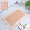 Alfombra de baño suave antideslizante de tierra de diatomeas, tapete de suelo de cocina de secado rápido, tapete absorbente de agua de tierra de diatomeas para baño, disponible para venta al por mayor en Douyin