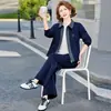 Novo Conjunto Casual Primavera e Outono 2026 para Mães, Conjunto de Duas Peças Elegante e Moderno para Mulheres de Meia-Idade e Idosas, Jaqueta Esportiva de Corte Amplo