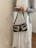 Nova Bolsa de Ombro Vintage com Design Trançado para Mulheres Verão 2026, Bolsa Única e Fashionável com Fivela de Metal para Axila, Bolsas Femininas no Atacado