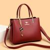 Bolso de mujer 2024 nueva moda bolso de mano de negocios transfronterizo retro de alta gama para ir al trabajo versátil multicapa bandolera