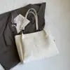 Novas bolsas de outono e inverno, bolsas tote versáteis, bolsas de ombro de grande capacidade, estilo de luxo simples e leve, bolsas casuais para o dia a dia com toque de qualidade