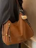 Bolsa de Ombro Nova Estilo Primavera 2026 Retrô Fashionável e Elegante de Aparência Sofisticada para Trabalhadores de Escritório no Trajeto Bolsa Tote Retrô