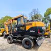 Excavadora de ruedas HYUNDA 150W-9 usada para proyecto de paisajismo municipal en buen estado
