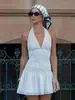 Vestido de Verão 2026 Estilo Europeu e Americano com Bolinhas Transfronteiriças, Decote Halter com Amarração, Cintura Franzida com Amarração, Curto com Costas Abertas