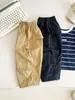 Vale do Vento 2026 Outono Novo Estilo Coreano Meninos Bonitos Calça Plissada Cimitarra Bonita Versátil Roupa de Trabalho Infantil Calça Comprida