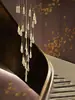 Novo lustre Americano de degraus em gota d'água 2024 escolha vazio giratório villa loft alto especial pequeno duplex lustre longo