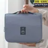 Bolsa de maquillaje moderna, tela de sarga, portátil, estilo coreano, simple y femenina, neceser, gran capacidad, bolsa de maquillaje para hombre con gancho