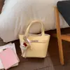 Moda de Primavera Transfronteriza Bolso de Mano para Mujer Bolso Tote Pequeño 2026 Nuevo Bolso Cubo Simple Bolso Versátil de Hombro Cruzado