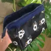 Bolsa de alambre de acero al por mayor de fábrica, bolsa multifuncional para almacenamiento de artículos de uso diario, marco de acero, categoría de cosméticos, bolso para mujer