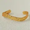 Pulsera geométrica hueca martillada a mano de estilo retro de moda para mujer, brazalete abierto ancho irregular a rayas único, transfronterizo